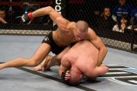 <p>The UFC’s Canadian debut, UFC 83 on April 19 at Montreal’s Bell Centre, was one of the loudest and most raucous nights in company history. Hometown hero Georges St-Pierre (L) avenged an upset loss to Matt Serra (R) via TKO in the main event, kicking off a welterweight title reign which would last five years and eight months. (Photo by Josh Hedges/Zuffa LLC via Getty Images) </p>