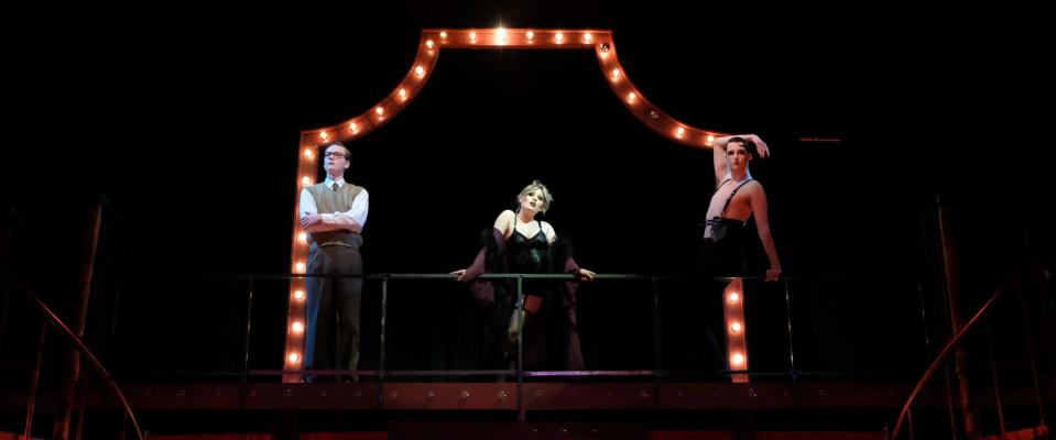 Left to right, Daniel Keener (Clifford Bradshaw), Shelby Zimmerman (Sally Bowles) and Jackson Gifford (Master of Ceremonies “Emcee”) in the Otterbein Departments of Theatre & Dance and Music production of “Cabaret.”