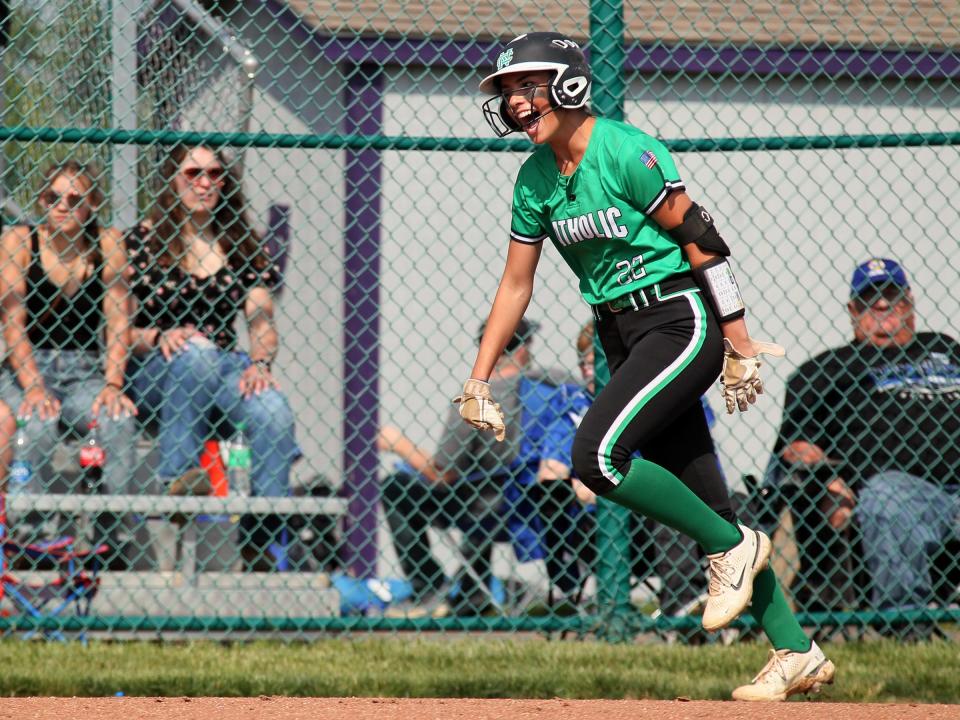 Newark Catholic's Kami Diaz celebrates hitting a home run against Danville during the Green Wave's 13-2 victory in a Division IV district final at Pickerington Central on Saturday, May 20, 2023.