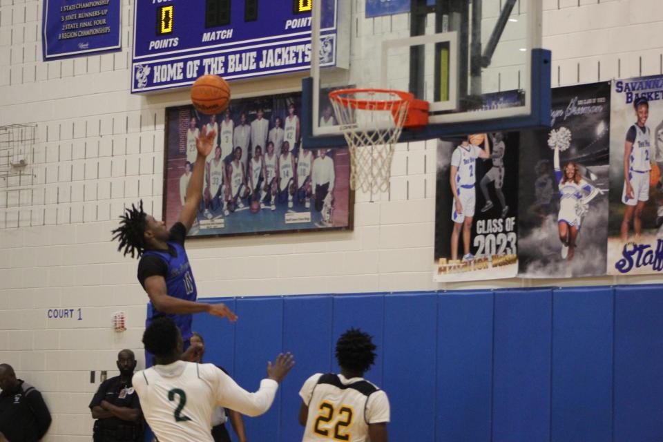 Kaleb Lofton of St. Andrew's drives to the basket in the Savannah Senior Showcase Wednesday night.