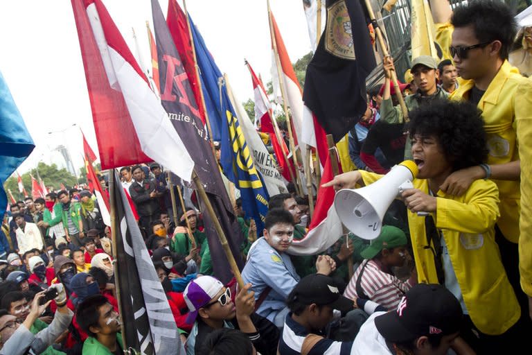 Indonesians protest at a rally against the government's plan to hike prices of fuel, in Jakarta, on March 30, 2012. Fuel subsidies have been a flashpoint issue for decades in Indonesia, and lowering them in the past has led to nationwide protests