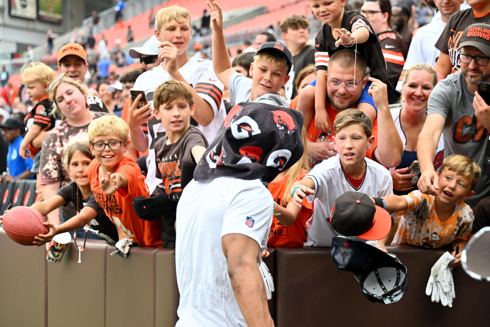 CLEVELAND, OHIO - AUGUST 21: Cleveland Browns fans try for an autograph from a player after a preseason game against the Philadelphia Eagles at FirstEnergy Stadium on August 21, 2022 in Cleveland, Ohio. The Eagles defeated the Browns 21-20.  (Photo by Jason Miller/Getty Images)