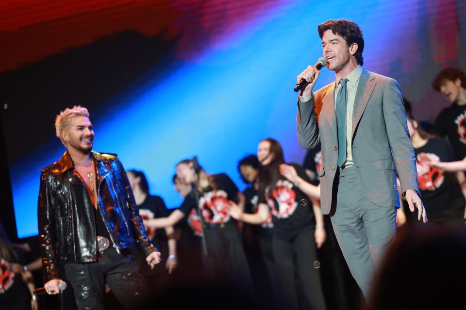 John Mulaney, right, also joined the "Big Mouth" cast for a show at the Greek Theatre on Thursday, where he performed with Adam Lambert, left.