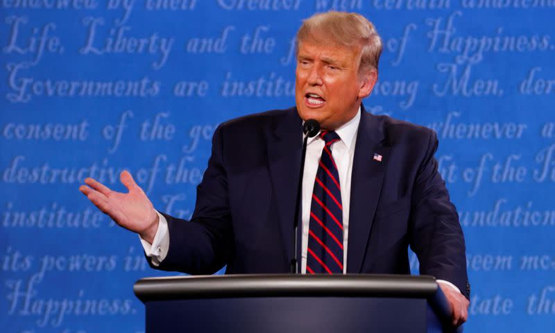 U.S. President Donald Trump and Democratic presidential nominee Joe Biden participate in their first 2020 presidential campaign debate in Cleveland