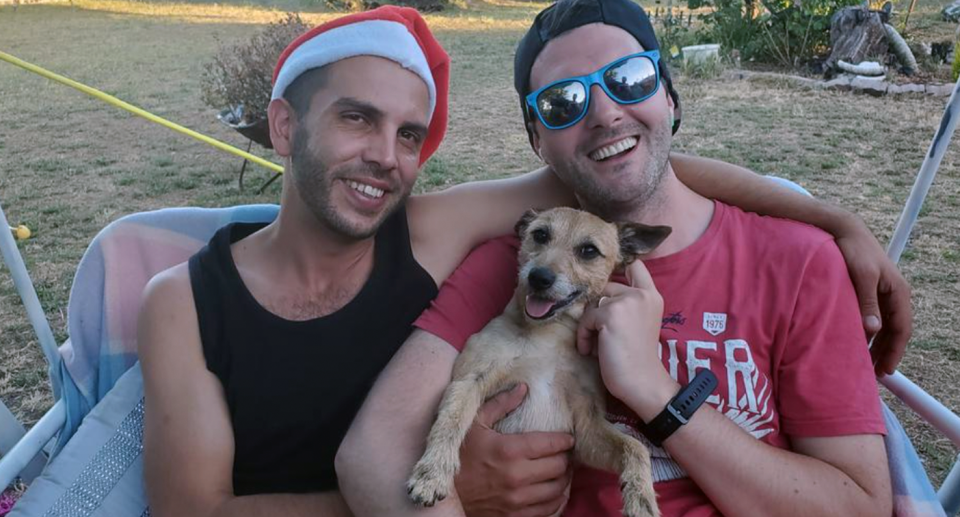 A view of Jason Whatnall (left) with his partner Nick and Milo. 