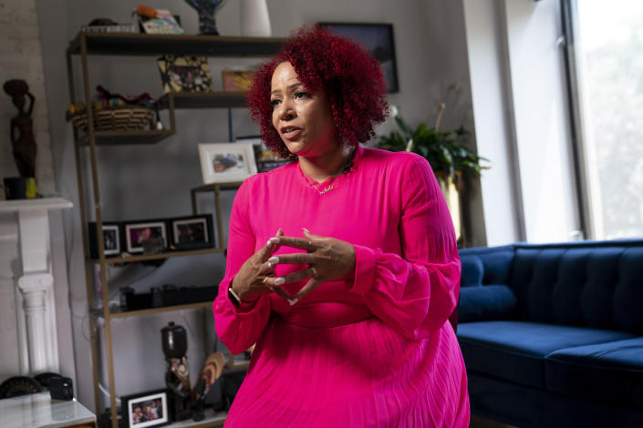 FILE - In this July 6, 2021, file photo Nikole Hannah-Jones is interviewed at her home in the Brooklyn borough of New York. Hannah-Jones opted against teaching at the University of North Carolina after a protracted tenure fight centered on conservative objections to her work and instead chose Howard University, where she will hold the Knight Chair in Race and Journalism. (AP Photo/John Minchillo, File)