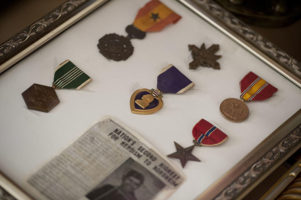 Medals received by Santiago Erevia, is photographed on Saturday, Feb. 22, 2014, at Erevia's home in San Antonio, Texas. Erevia is one of twenty-four army veterans who will receive the award following a congressionally mandated review conducted to ensure that eligible award recipients were not bypassed due to prejudice. (AP Photo/Darren Abate)