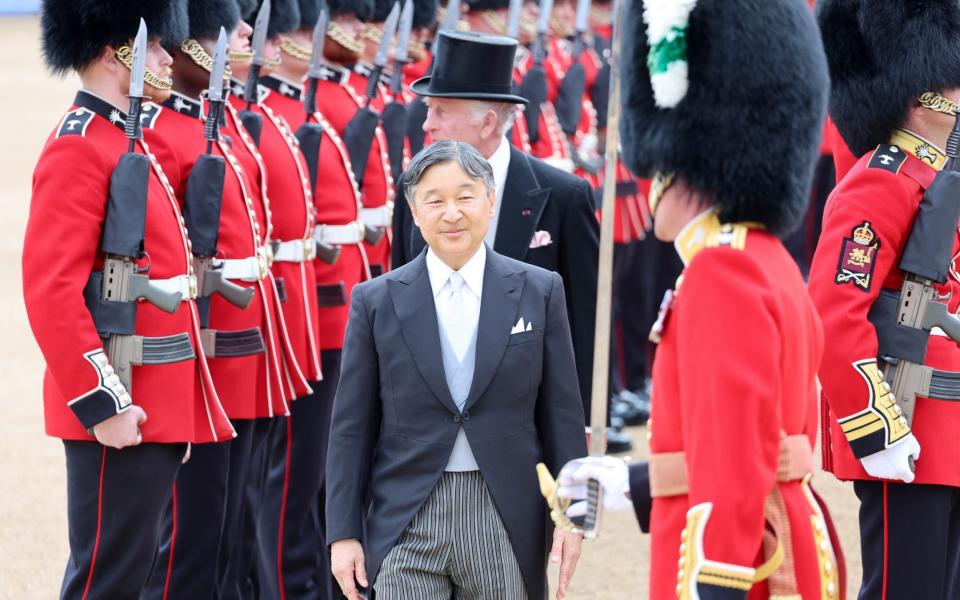 King Charles and Emperor Naruhito of Japan perform their ceremonial duties