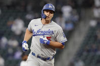 Los Angeles Dodgers' Corey Seager rounds the bases after hitting a two-run home run during the third inning of a baseball game against the Seattle Mariners, Monday, April 19, 2021, in Seattle. (AP Photo/Ted S. Warren)