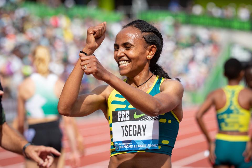 Gudaf Tsegay, of Ethiopia, celebrates a world record in the women’s 5,000 meters during the second day of the annual Prefontaine Classic Sunday, Sept. 17, 2023, at Hayward Field in Eugene, Ore.