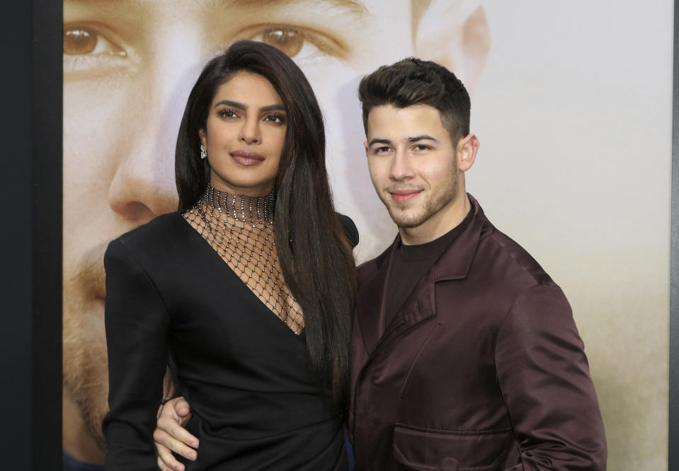 FILE - Priyanka Chopra Jonas, left, and husband Nick Jonas attend the world premiere of "Chasing Happiness," in Los Angeles on June 3, 2019. Chopra Jonas and Jonas announced on their Instagram pages Friday, Jan. 21, 2022, that they welcomed their first baby together. She said a surrogate gave birth to the couple’s baby on Jan. 15. (Photo by Willy Sanjuan/Invision/AP, File)