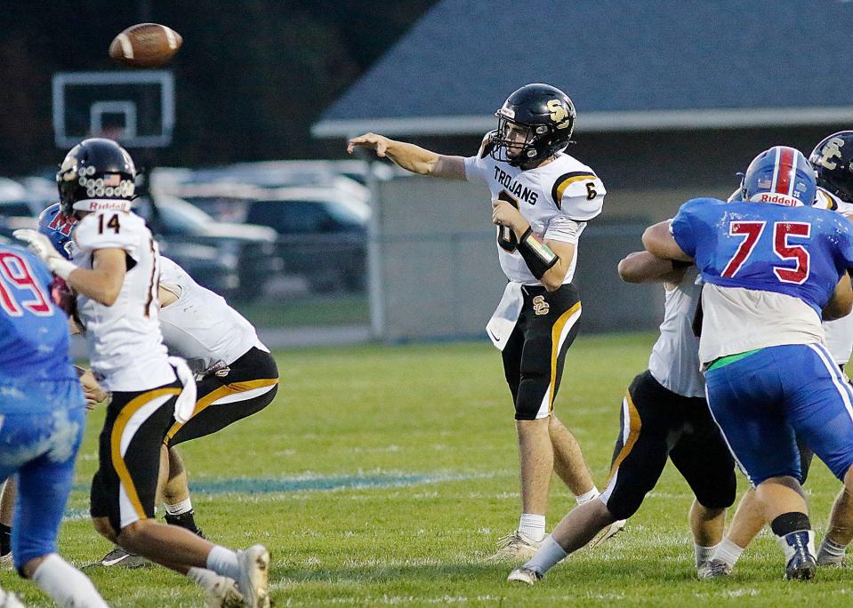 South Central High School's Brandon Mitchell (6) throws a pass against Mapleton High School during high school footbal action Friday, Oct. 8, 2021 at Mapleton High School. TOM E. PUSKAR/TIMES-GAZETTE.COM