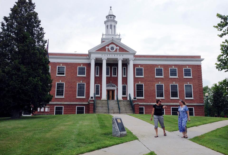 In this July 9, 2015 photo, people walk across the campus at Castleton State College, now called, Castleton University, in Castleton, Vt. Castleton became part of the new Vermont State University on July 1, 2023