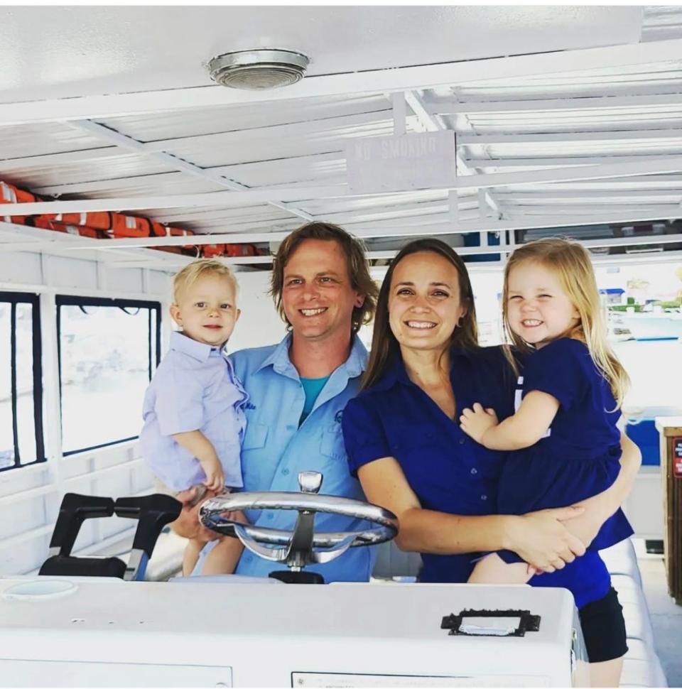 Jessica and Mike Jadick and their children, Isla, 5, and Malakai, 3, aboard the Osprey, one of the couple's three vessels used for commercial excursions and nonprofit educational boat tours in St. Augustine.