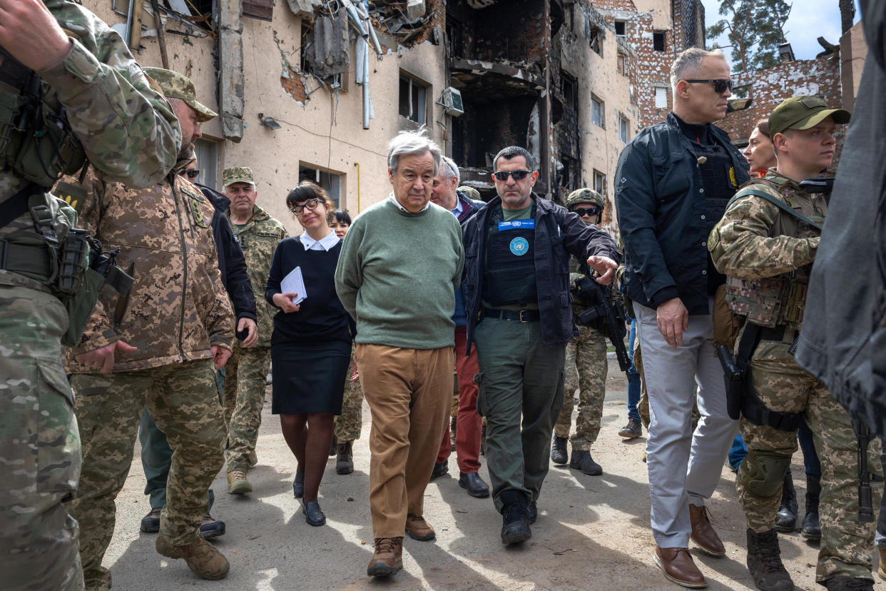 U.N. Secretary-General António Guterres views the destruction at an apartment complex in Irpin, Ukraine.