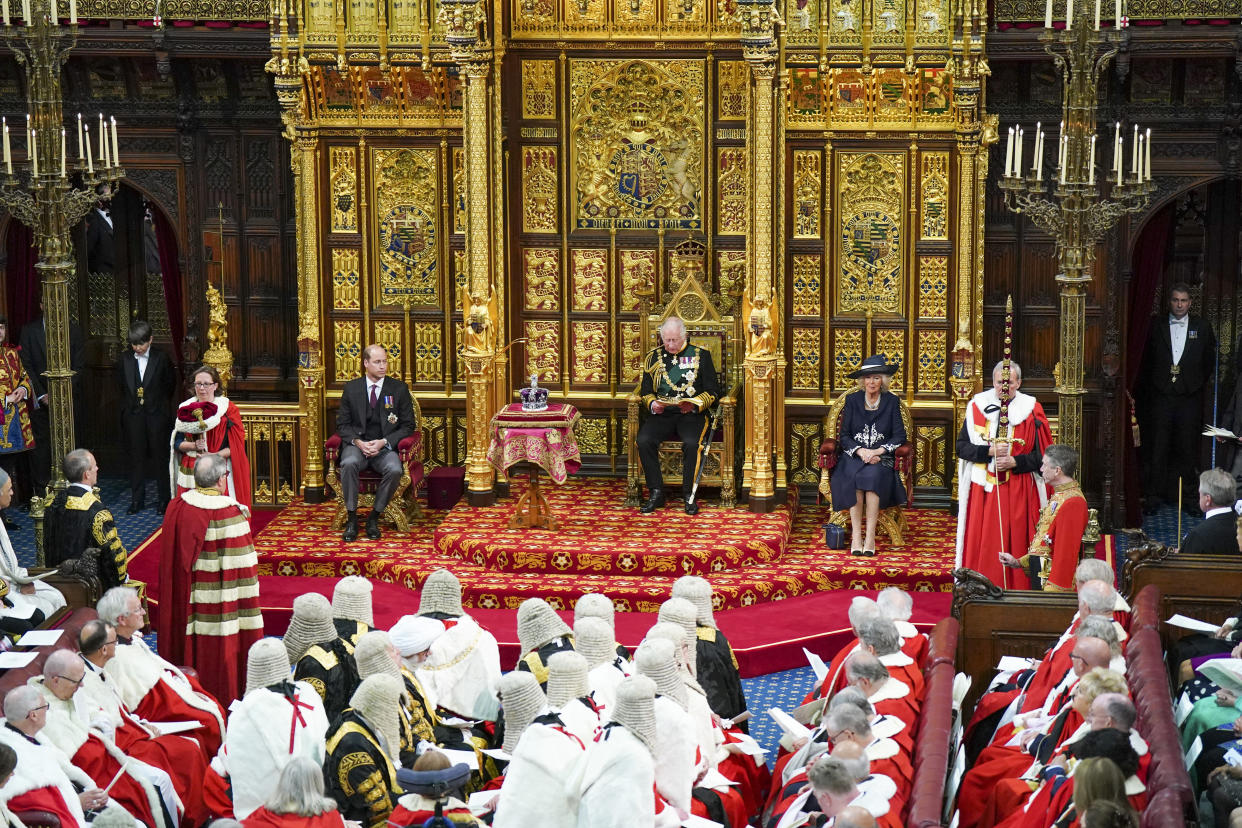 The Prince of Wales, flanked by the Duke of Cambridge and the Duchess of Cornwall reads the Queen's Speech during the State Opening of Parliament in the House of Lords, London. Picture date: Tuesday May 10, 2022.