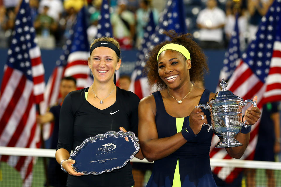 Serena Williams of the United States poses with the championship trophy next to Victoria Azarenka of Belarus following her victory in the women's singles final match on Day Fourteen of the 2012 US Open at USTA Billie Jean King National Tennis Center on September 9, 2012 in the Flushing neighborhood of the Queens borough of New York City. (Photo by Al Bello/Getty Images)