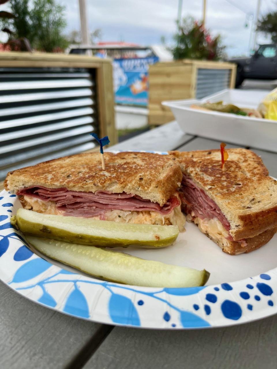 Bimini Bites owner Greg Ryng takes his time creating the popular Reuben sandwich, grilling it to get the bread just the right amount of crispy.