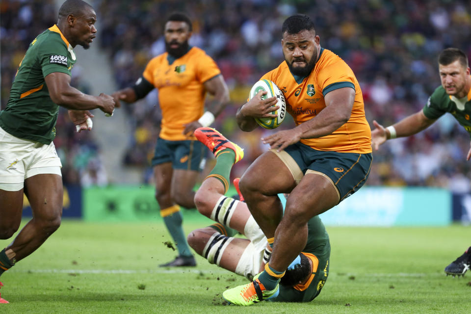 Australia's Taniela Tupou makes a run during the Rugby Championship test match between the Springboks and the Wallabies in Brisbane, Australia, Saturday, Sept. 18, 2021. (AP Photo/Tertius Pickard)