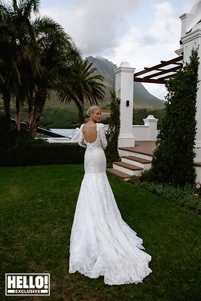 Lady Amelia Spencer looks over her shoulder, her bridal dress flows behind her