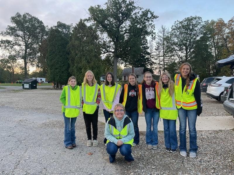 Members of the Northwestern FFA volunteered their time at Lincoln Way Vineyards to help park cars for the 5kWineRun.
(Credit: Photo provided by Northwester FFA)