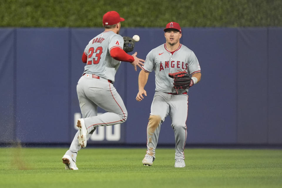 Los Angeles Angels second baseman Brandon Drury (23) and Luis Rengifo are unable to catch a hit by Miami Marlins' Tim Anderson during the seventh inning of a baseball game, Tuesday, April 2, 2024, in Miami. (AP Photo/Marta Lavandier)