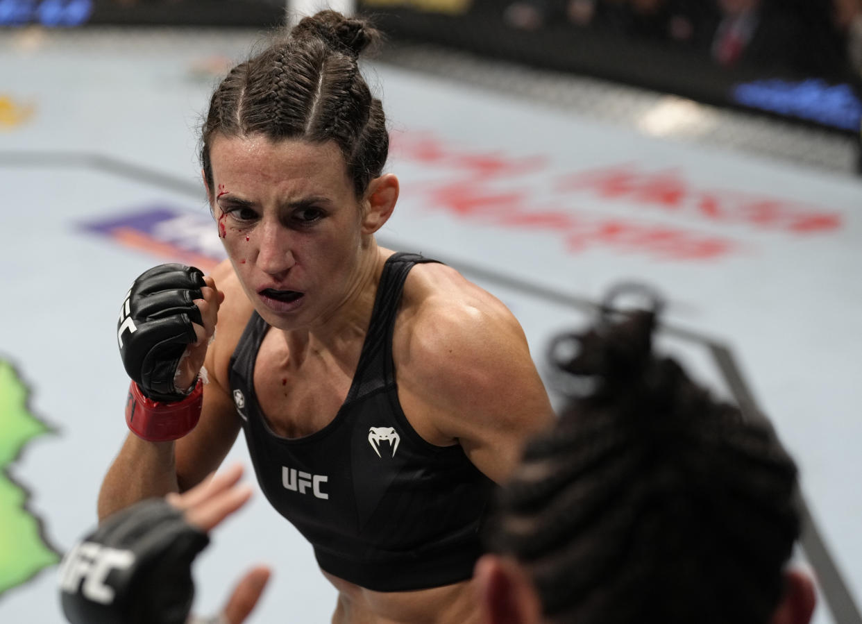 LAS VEGAS, NEVADA - MARCH 05: (L-R) Marina Rodriguez of Brazil battles Yan Xiaonan of China in their lightweight fight during the UFC 272 event on March 05, 2022 in Las Vegas, Nevada. (Photo by Jeff Bottari/Zuffa LLC)