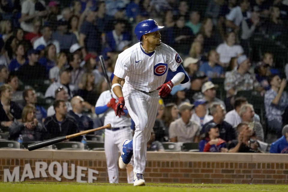 Chicago Cubs' Christopher Morel watches his two-run single off Cincinnati Reds relief pitcher Art Warren during the seventh inning of a baseball game Tuesday, Sept. 6, 2022, in Chicago. (AP Photo/Charles Rex Arbogast)