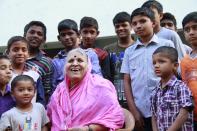 <p>Sindhutai Sapkal, also known as the "Mother of Orphans," posed with some of her children in Pune, India, on February 16, 2017. Through the years, Sapkal, 68, has cared for more than 1400 kids.</p><p><strong>RELATED: </strong><a href="https://www.redbookmag.com/life/charity/g3152/motivational-quotes/" rel="nofollow noopener" target="_blank" data-ylk="slk:100 Motivational Quotes to Help You Get After It;elm:context_link;itc:0;sec:content-canvas" class="link "><strong>100 Motivational Quotes to Help You Get After It</strong></a></p>