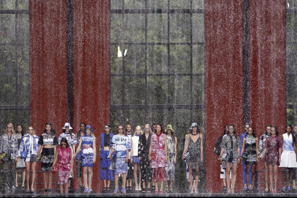 Models present creations as part of Kenzo's ready-to-wear Spring/Summer 2014 fashion collection, presented Sunday, Sept. 29, 2013 in Paris. (AP Photo/Thibault Camus)