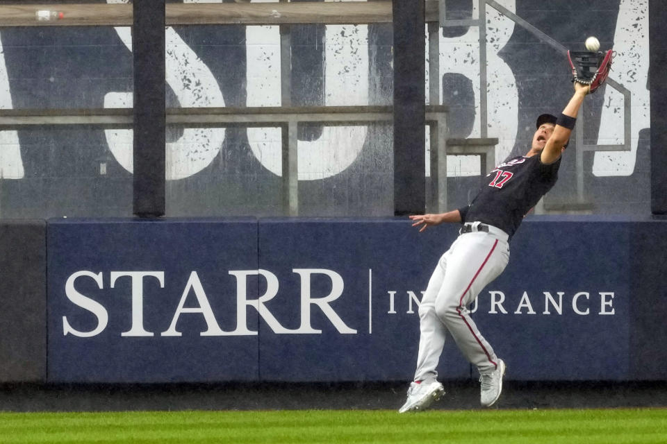 Washington Nationals center fielder Alex Call catches a fly ball by New York Yankees' Harrison Bader to end a baseball game in the ninth inning Thursday, Aug. 24, 2023, in New York. (AP Photo/Mary Altaffer)