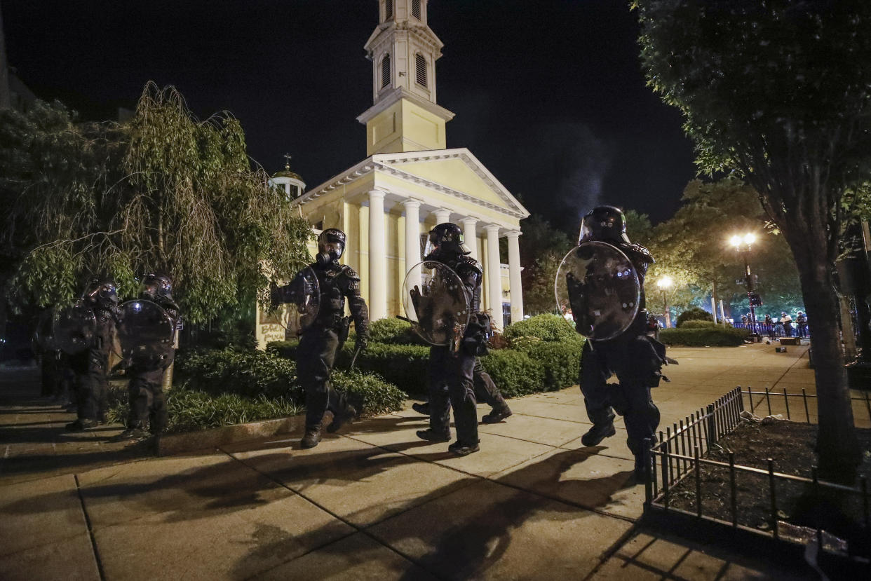 Police form a line in front of St. John's Episcopal Church on May 31, 2020, near the White House in Washington.  (Photo: ASSOCIATED PRESS)