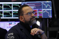 Specialist Anthony Matesic works at his post on the floor of the New York Stock Exchange, Friday, Feb. 28, 2020. Stocks are opening sharply lower on Wall Street, putting the market on track for its worst week since October 2008 during the global financial crisis. (AP Photo/Richard Drew)