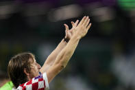 Luka Modric celebrates after Croatia defeated Brazil in a penalty shootout during a World Cup quarterfinal soccer match at the Education City Stadium in Al Rayyan, Qatar, Friday, Dec. 9, 2022. (AP Photo/Manu Fernandez)