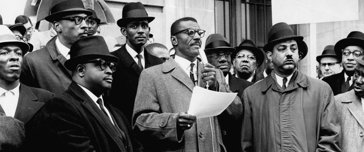 The Rev. Fred Shuttlesworth speaks from the steps of the Hamilton County Courthouse in 1965, as marchers protesting police brutality in Selma, Alabama, stood before him.