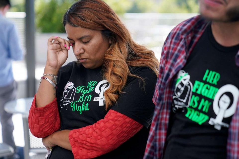 PHOTO: Samantha Casiano, who was forced to carry a nonviable pregnancy to term and give birth to a baby who died four hours after birth, stands outside the Travis County Courthouse, July 19, 2023, in Austin, Texas. (Eric Gay/AP)