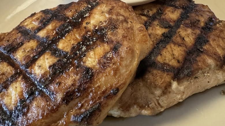 Grilled pork chops on plate