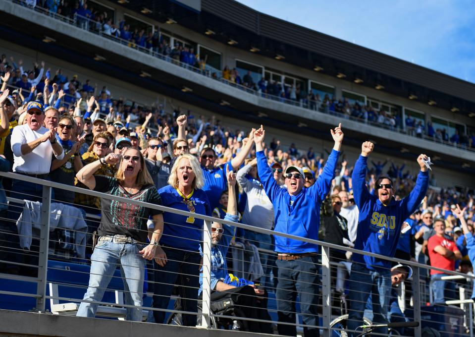 South Dakota State fans cheer as the team scores a touchdown in the annual Dakota Marker game on Saturday, November 6, 2021 at Dana J. Dykhouse Stadium in Brookings.