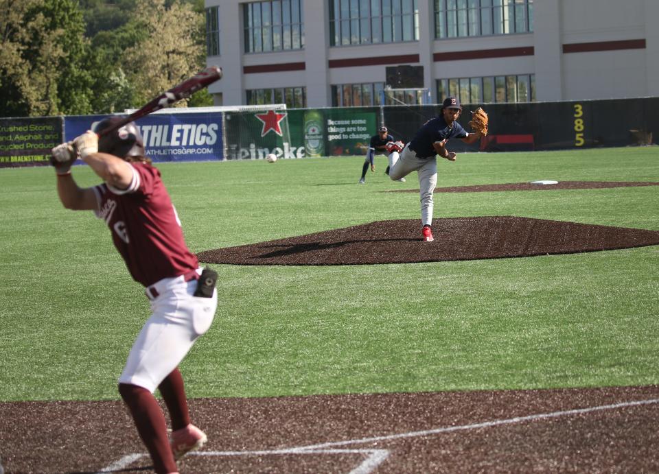 Paterson, NJ — Starting pitcher Delvison Reyes throws the first pitch of the game to James Hinspeter of Don Bosco. The Eastside HS baseball team play its first game in 26 years at the rebuilt Hinchliffe Stadium on May 17, 2023.