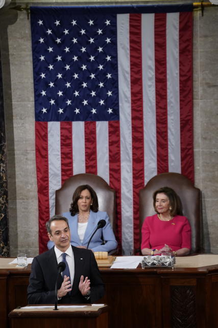 Speaker of the House Nancy Pelosi of Calif., right, and Vice President Kamala Harris, left, listen as Greek Prime Minister Kyriakos Mitsotakis delivers remarks to a joint session of Congress, Tuesday, May 17, 2022, in Washington. (AP Photo/Evan Vucci)