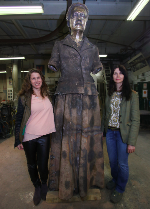 <em>Caroline Criado-Perez (left) with artist Gillian Wearing – who designed the statue (PA)</em>