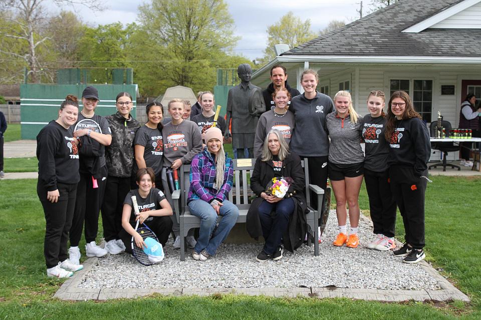 The Sturgis tennis program donated a bench and plaque to former coach Budd Munson on Saturday morning.
