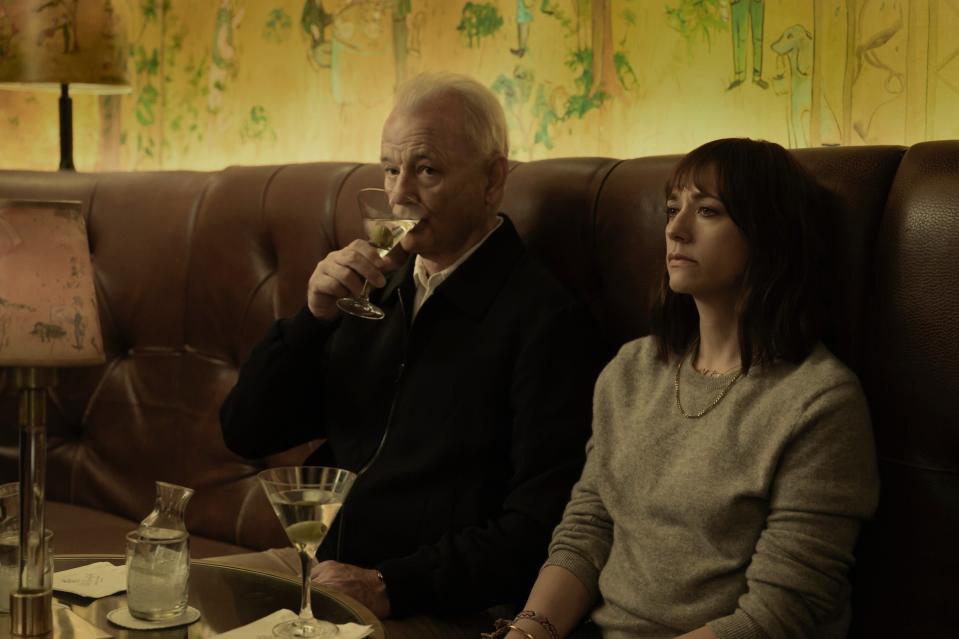 Bill Murray and Rashida Jones sip martinis at a bar