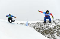 <p>SIERRA NEVADA, SPAIN – MARCH 13: Lukas Pachner (R) of Austria competes with Alex Deibold of the United States during the Men’s Team Snowboard Cross Small Final on day six of the FIS Freestyle Ski and Snowboard World Championships. (Getty Images) </p>