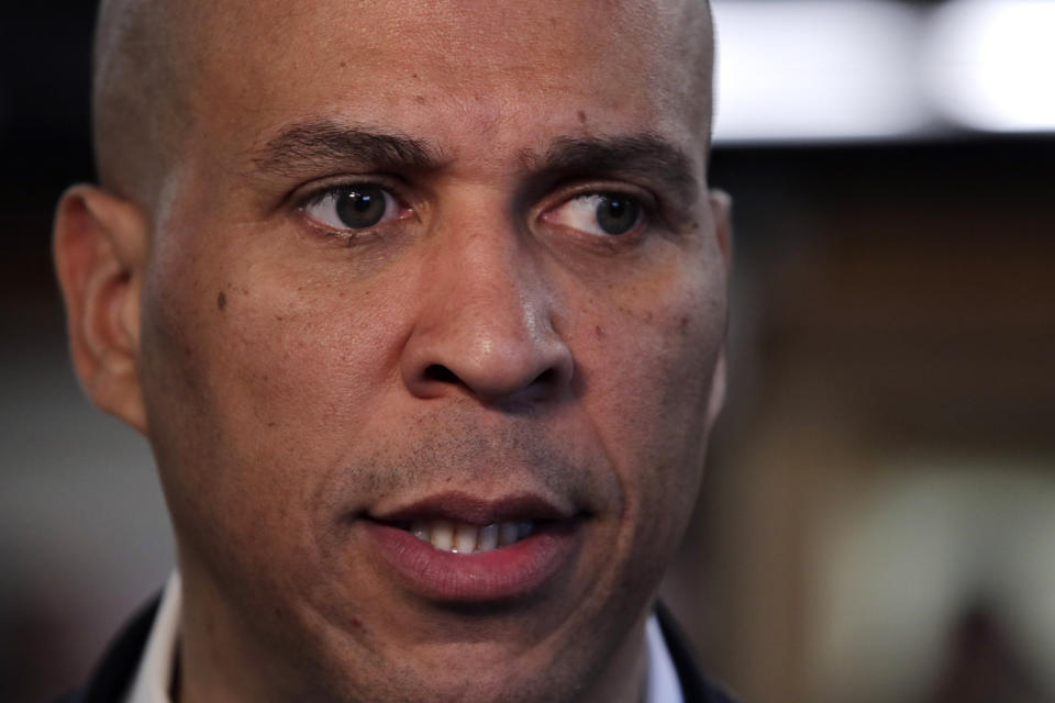 Democratic presidential candidate Sen. Cory Booker, D-N.J., listens to a question during a campaign stop in Nashua, N.H., Friday, Jan. 3, 2020. (AP Photo/Charles Krupa)