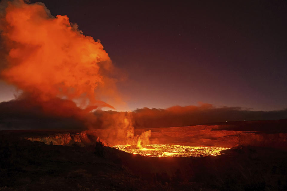 This photo provided by Janice Wei shows the eruption inside the summit crater of the Kilauea volcano on the Big Island of Hawaii, Thursday, Jan. 5, 2023. Hawaii's Kilauea, one of the world's most active volcanoes, is erupting again and providing a spectacle that includes bursting lava fountains and lava "waves" but no Big Island communities are in danger. (Janice Wei via AP)