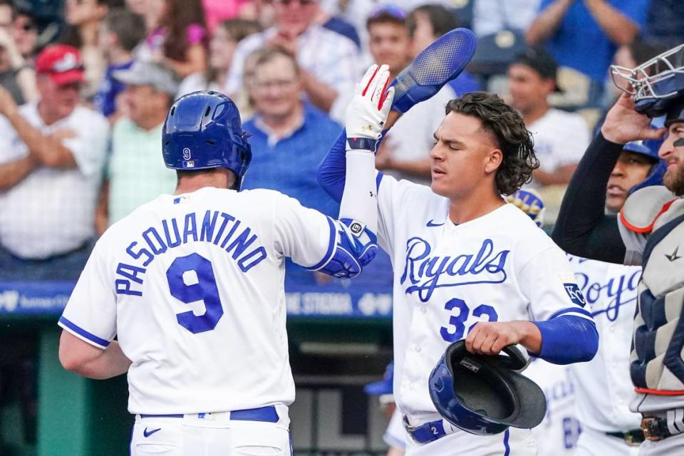 Kansas City Royals first baseman Vinnie Pasquantino (9) celebrates with left fielder Nick Pratto (32) after hitting a two-run home run against the Detroit Tigers at Kauffman Stadium on May 22, 2023.