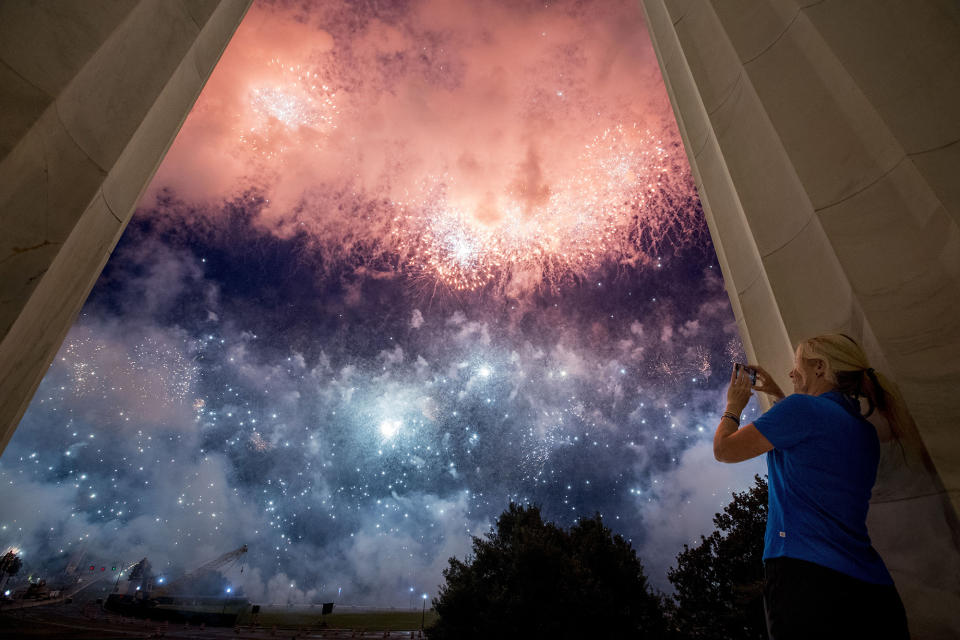 Fireworks seen from the Lincoln Memorial explode over the Potomac River on July 4, 2019.