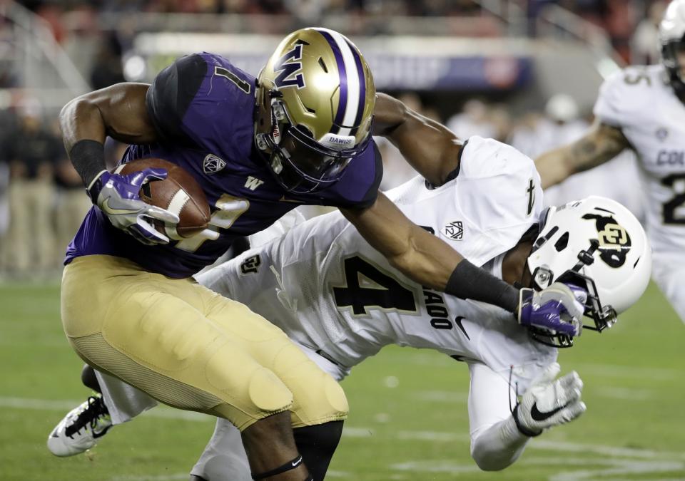 Washington receiver John Ross had a highlight reel touchdown catch in the second half of the Pac-12 title game. (AP Photo/Marcio Jose Sanchez)