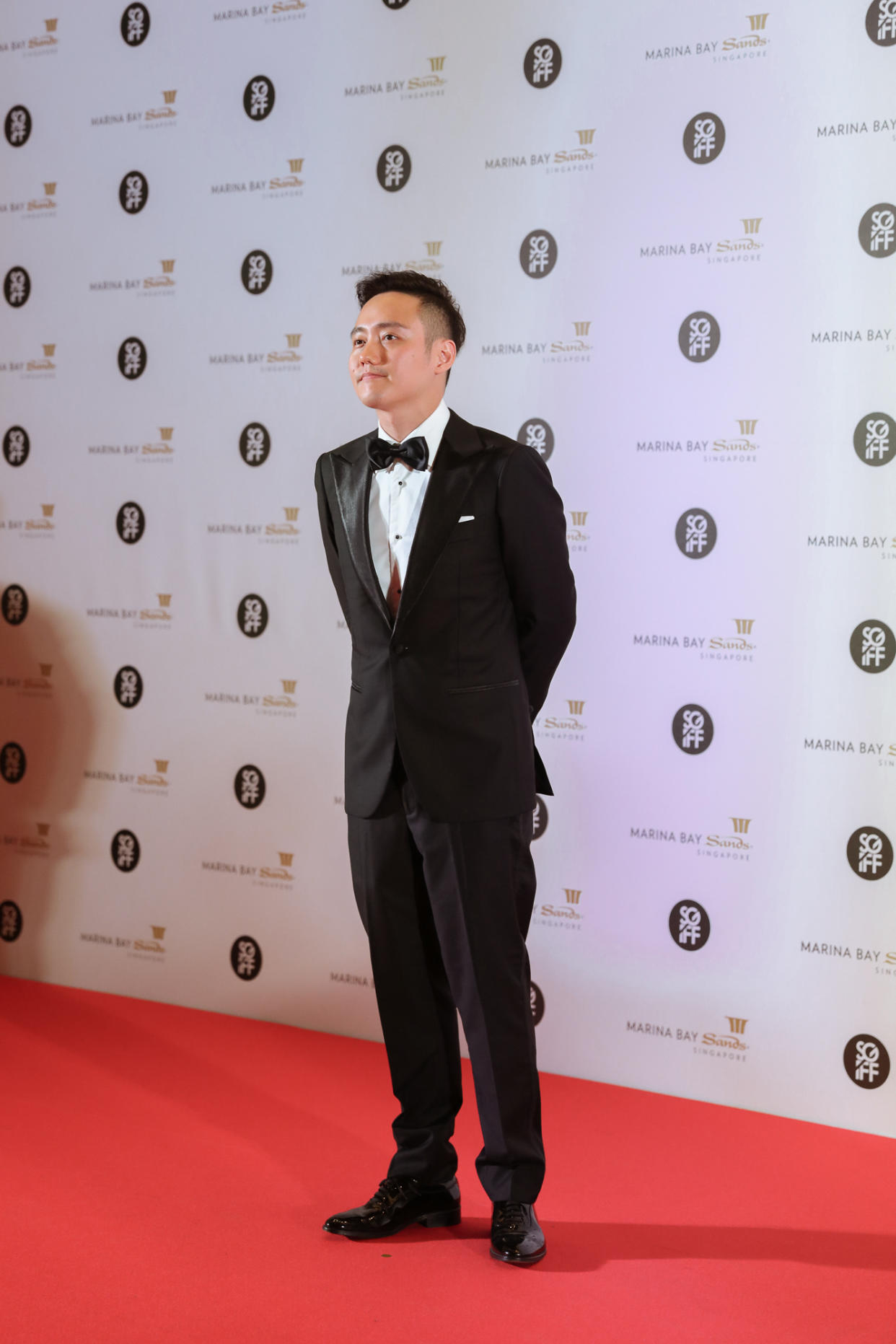 Singaporean film maker Boo Junfeng on the red carpet at the 28th SGIFF Benefit Dinner at MBS. (Photo: Don Wong for Yahoo Lifestyle Singapore)